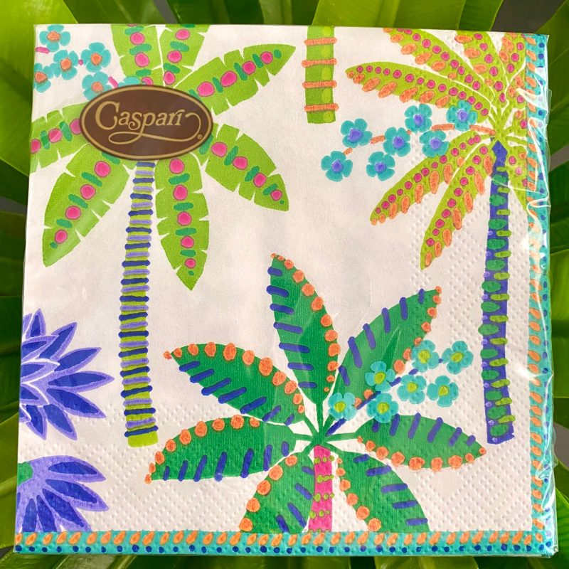 a close up of tropical cocktail napkins with palm trees