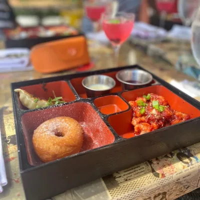 a bento box of asian food