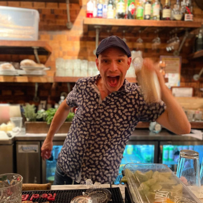 bartender shaking a cocktail