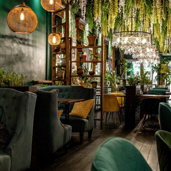 the inside of a botanical dining room in a restaurant