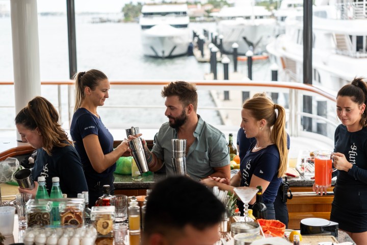 learning how to use a cocktail shaker