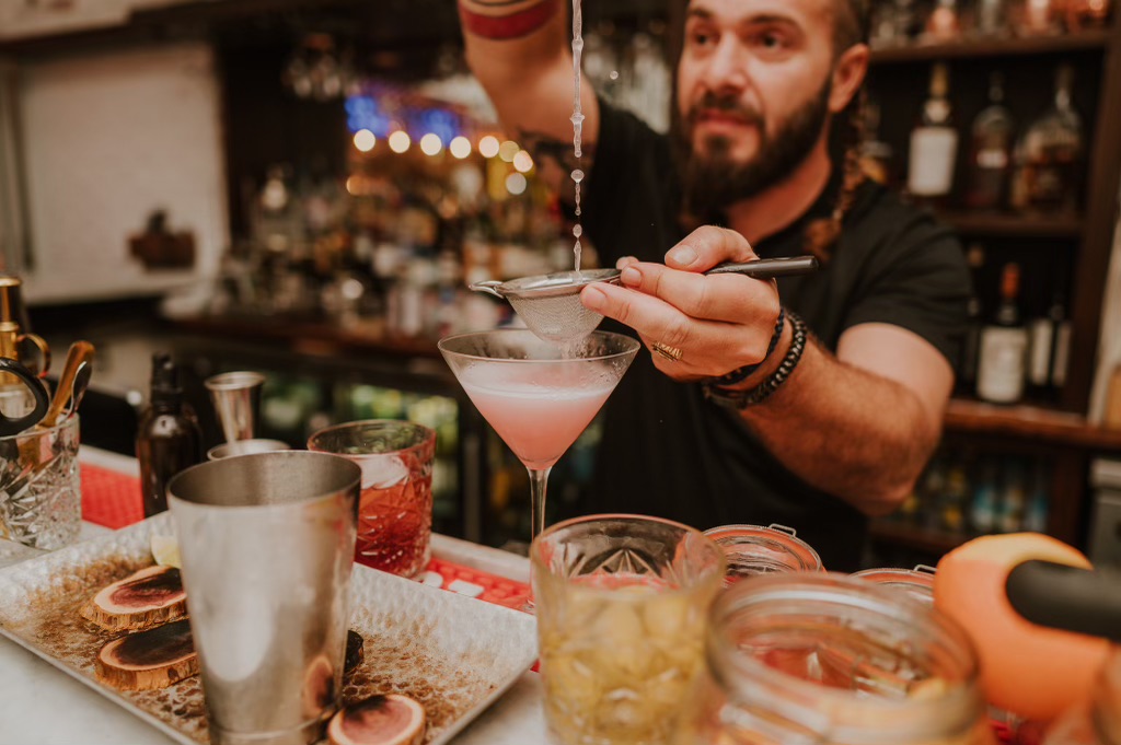 lvl_2478 a person making a cocktail