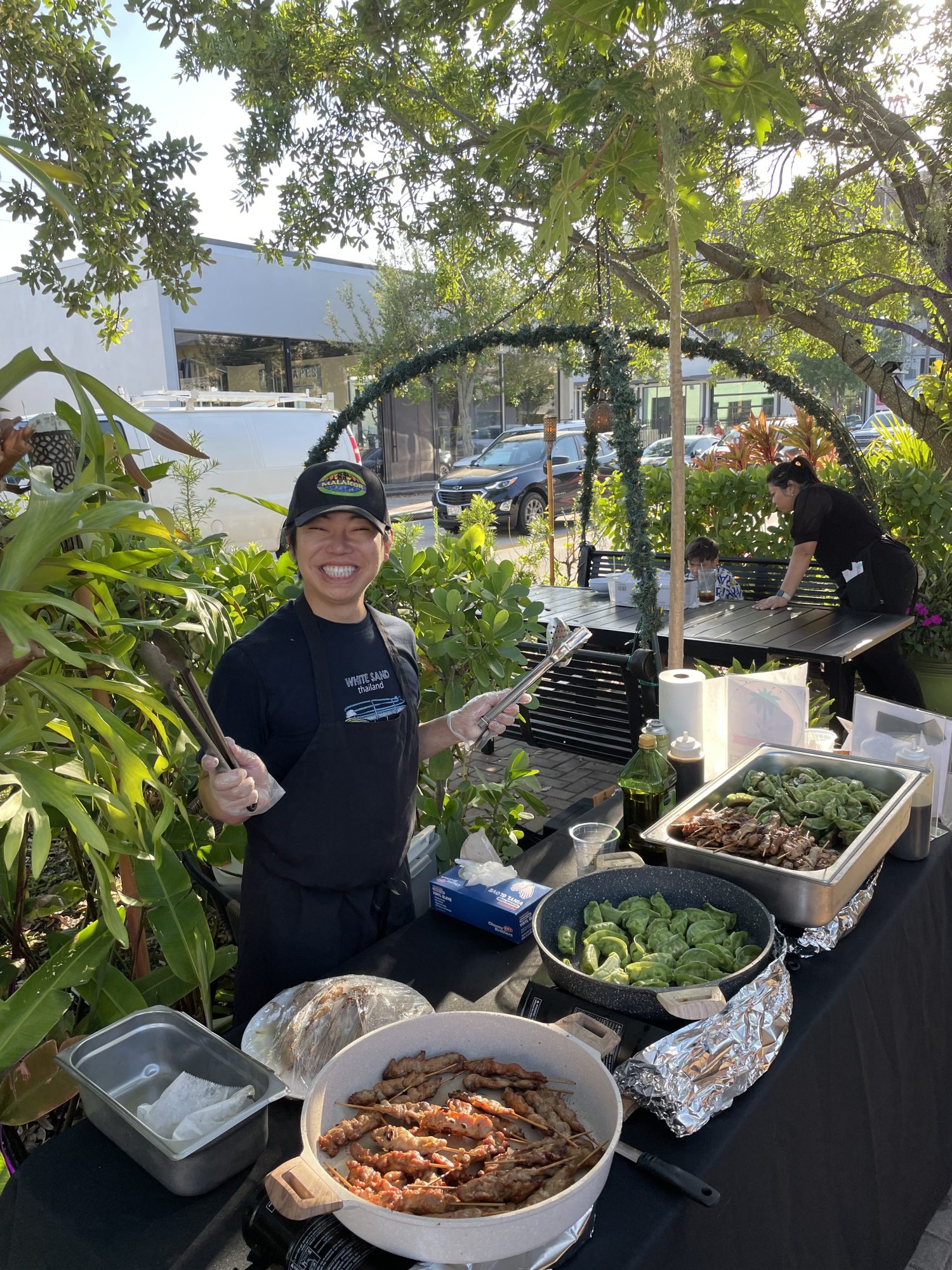 a person holding a plate of food